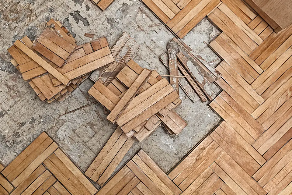 wood floor tiles damaged from water